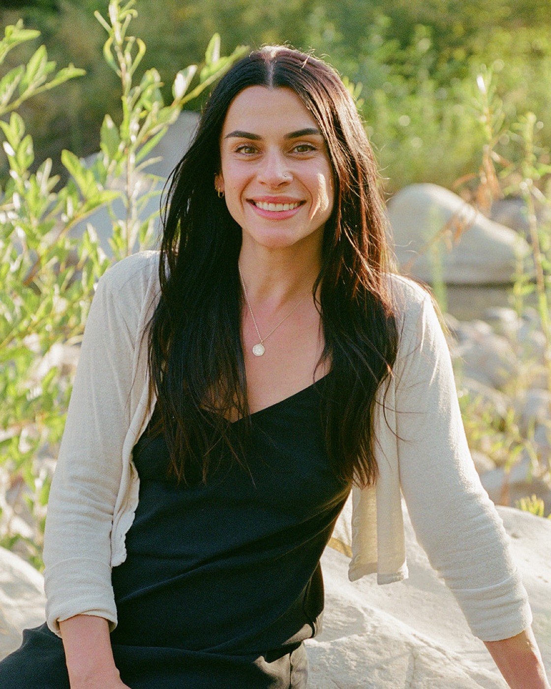 Mariam Friedman, seated outdoors in Ojai, California